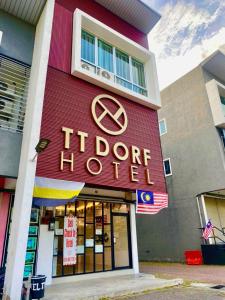 太平TT Dorf Hotel Taiping的一座建筑,上面标有读图图酒店