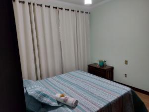 Espaço Aconchego客房内的一张或多张床位