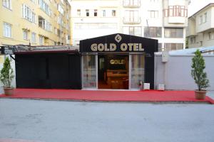 卡斯塔莫努GOLD OTEL KASTAMONU的一座有读金油标志的建筑