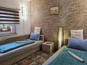 Apartmani Villas客房内的一张或多张床位