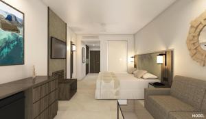 勒莫尔尼Riu Turquoise - All Inclusive的酒店客房,配有床和沙发