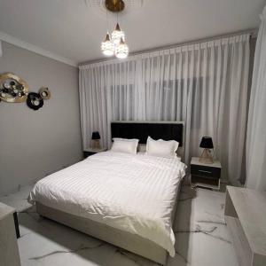 Luxury 4-bedrooms apartment客房内的一张或多张床位