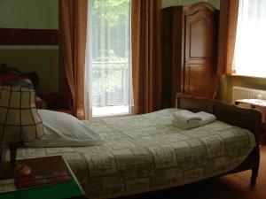 奥斯罗德度假酒店客房内的一张或多张床位