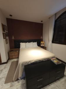 Casa em mangaratiba客房内的一张或多张床位