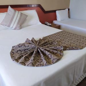 Granville Eco Resort客房内的一张或多张床位