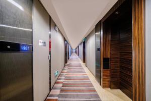 广州一呆公寓（广州保利世贸会展中心店）的走廊,建筑的走廊,长长的走廊