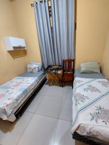Pousada Cantinho da Família客房内的一张或多张床位