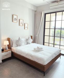 White Lotus Hotel - Swanbay客房内的一张或多张床位