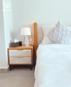 White Lotus Hotel - Swanbay客房内的一张或多张床位