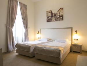 格利韦塔欧洲酒店客房内的一张或多张床位