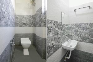 那格浦尔FabExpress Shivas Inn的一间带卫生间和水槽的浴室