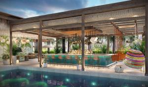 Anse a La MoucheCanopy By Hilton Seychelles Resort的 ⁇ 染带游泳池的度假村