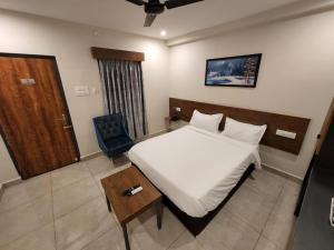 Hotel Park Varaahi客房内的一张或多张床位