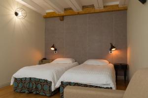 布兰塔河上坎普朗哥Contra' Contarini的两张睡床彼此相邻,位于一个房间里