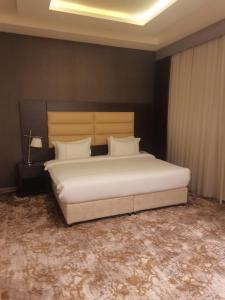 فندق دان البلاتيني客房内的一张或多张床位