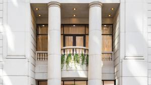 香港香港逸兰铜锣湾酒店的柱子的建筑大厅的 ⁇ 染
