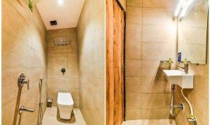 孟买FabHotel Ascot International II的一间带卫生间和水槽的浴室