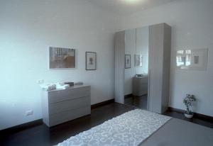 Casa Vacanze Garbatella客房内的一张或多张床位