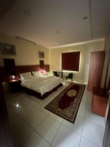 Nice Suites & Hotels客房内的一张或多张床位