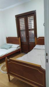Ismailia - Elnouras compound客房内的一张或多张床位
