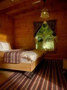 كوخ آفيري Aviary Hut客房内的一张或多张床位