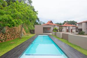 巴利托56 Zimbali Wedge的一座房子后院游泳池的形象