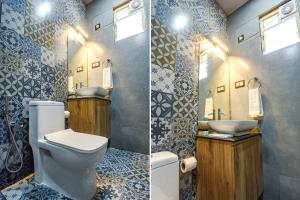 莫尔穆冈FabHotel Bay Boutique By Foxtale的浴室的两张照片,配有卫生间和水槽
