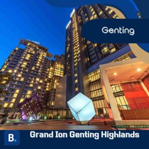 云顶高原Grand Ion Genting Highlands的一群高大的建筑在晚上在城市里