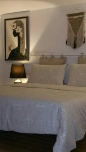 Cristina’s flat Riccione客房内的一张或多张床位