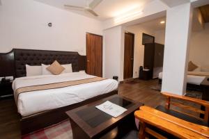 Tiara Regency Gangtok客房内的一张或多张床位