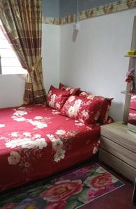 Homestay ALHAQIM客房内的一张或多张床位