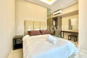 吉隆坡Dorsett Residences, Sri Hartamas-KL, Hotel Theme Studio Homes by Flexihome-MY的卧室配有一张床