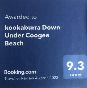 悉尼kookaburra Down Under Coogee Beach的谷歌海滩下显示的标志的屏幕