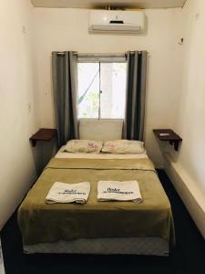 Hostel Jericoacoariano客房内的一张或多张床位