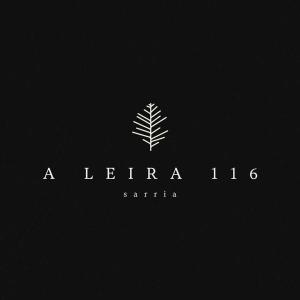 萨里亚A Leira 116 Cabañas de diseño的黑底上的叶标志