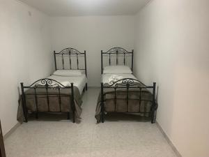 圣焦尔焦约尼科HOLIDAY PATRIZIA'S HOME 2.0的两间相邻的单人床位