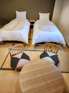 白马花乃乡酒店客房内的一张或多张床位