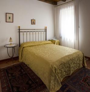达尼诺提农家乐客房内的一张或多张床位