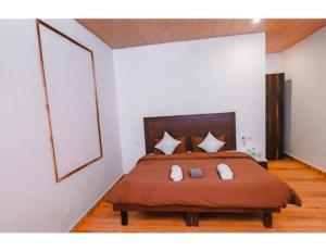 Shiv Sutra Resorts, Mussoorie客房内的一张或多张床位