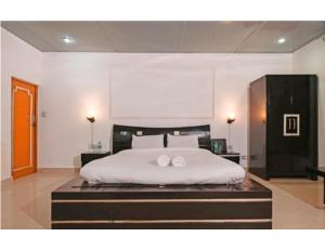 Shiv Sutra Resorts, Mussoorie客房内的一张或多张床位