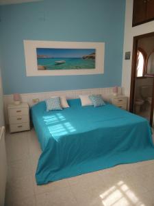 Casa Coma-Ruga Costa Dorada客房内的一张或多张床位