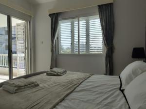 Kato Paphos 2 Bedroom House - Tourist location客房内的一张或多张床位