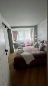 Belle Vue Malaga Suite客房内的一张或多张床位