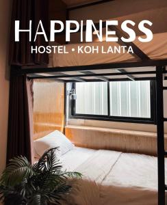 Phra Ae beachHappiness Hostel的兰塔纳科蒂基幸福旅馆一张海报,带一张床