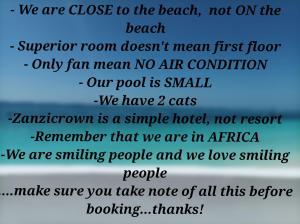 南威Zanzicrown的海滩上的短信,上面写着我们靠近海滩的字眼
