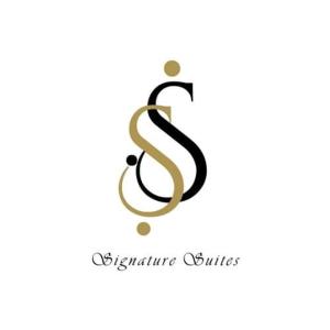 伊洛伊洛Unit 3J Signature Suites, Lafayette Megaworld的黑色和金色的字母标志