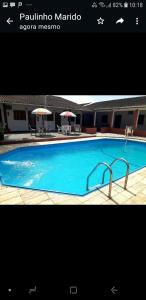 卡纳内亚Pousada Por do Sol的一张酒店游泳池的照片