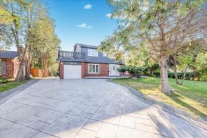Stunning 7 Br RougeView Home with 2 Kitchens, 5 Bathrooms, Amazing Backyard & 8-Car Parking