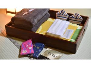 YokokuraOyado Kotobuki - Vacation STAY 97600v的装满不同类型领带的木箱