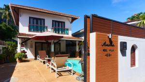 甲米镇Ananda Private Pool Villa, Ao Nang的一座带游泳池和房子的别墅